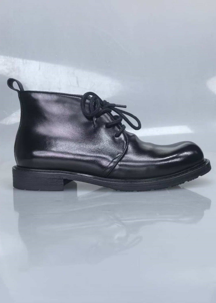 Genuine shell cordovan leather short lace-up Martin boots by Rossie Viren with durable leather soles and classic design.