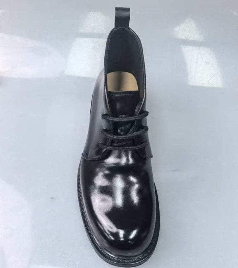 Genuine Shell Cordovan leather short lace-up Martin boots by Rossie Viren, showcasing polished leather and sturdy design.