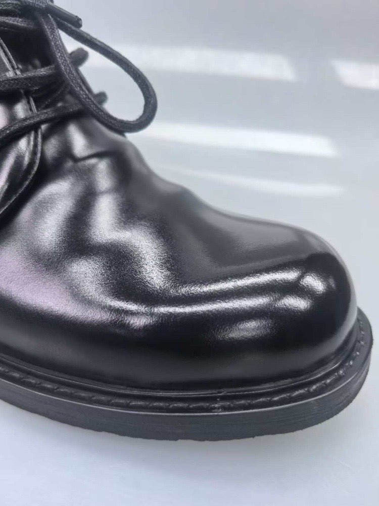 Genuine Shell Cordovan leather short lace-up Martin boots by Rossie Viren, showcasing classic design and rich leather texture.