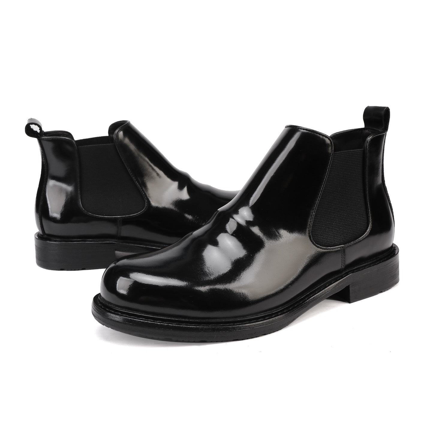 Genuine Shell Cordovan leather Martin boots by Rossie Viren with round toe and classic shoe design.