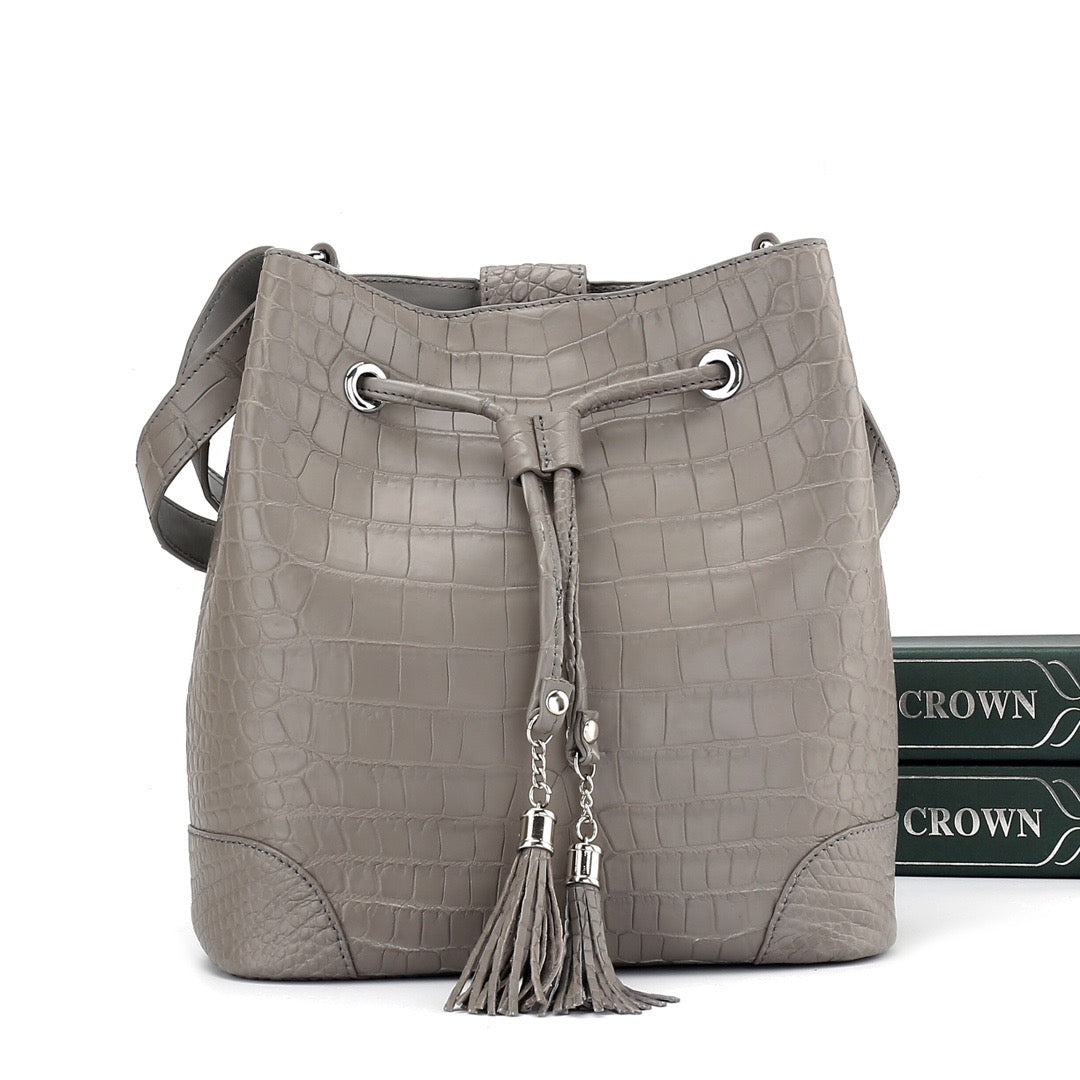 Unisex crocodile leather drawstring bucket shoulder purse by Rossie Viren, featuring a large capacity handbag with crossbody strap.