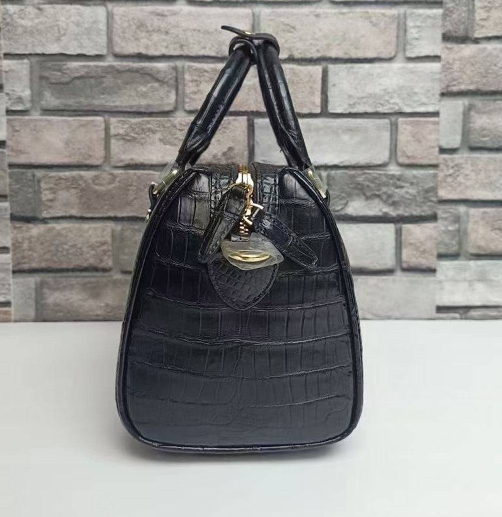 Black crocodile leather Rossie Viren top handle Boston cross body handbag with structured design and gold-tone hardware.