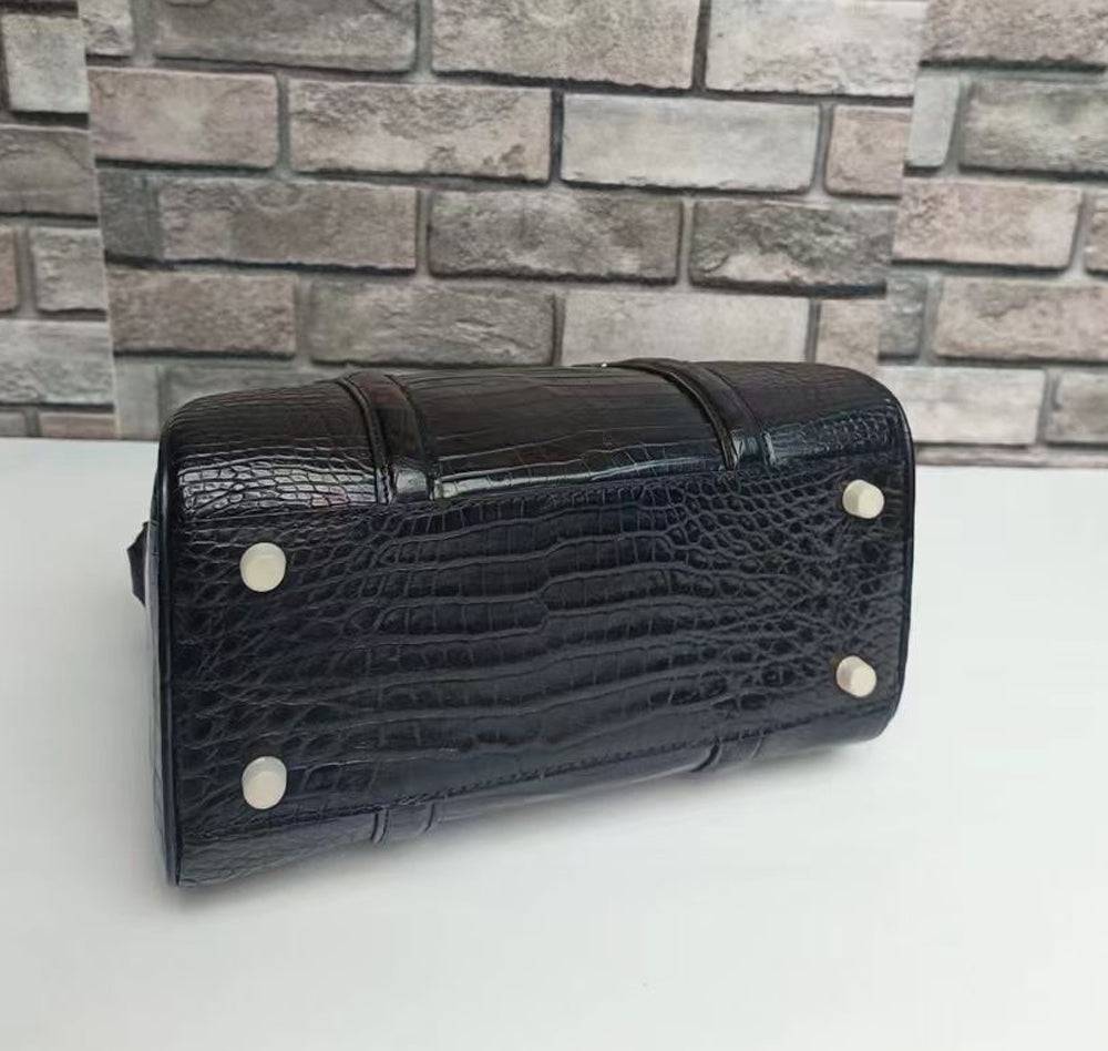 Black crocodile leather Rossie Viren top handle Boston crossbody handbag with structured design and gold-tone hardware.