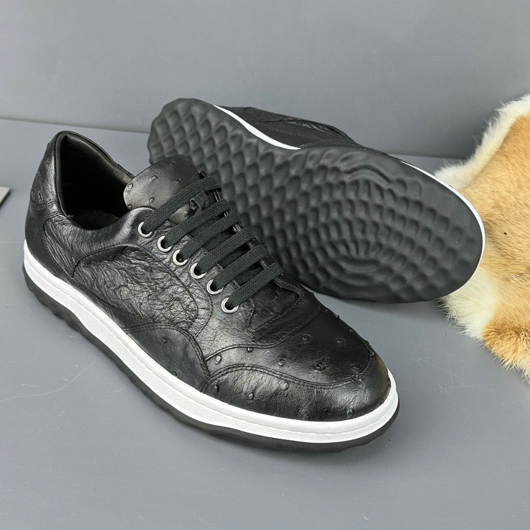 Rossie Viren ostrich skin leather sneaker showing a close-up of the textured black shoe with stylish stitching and laces.