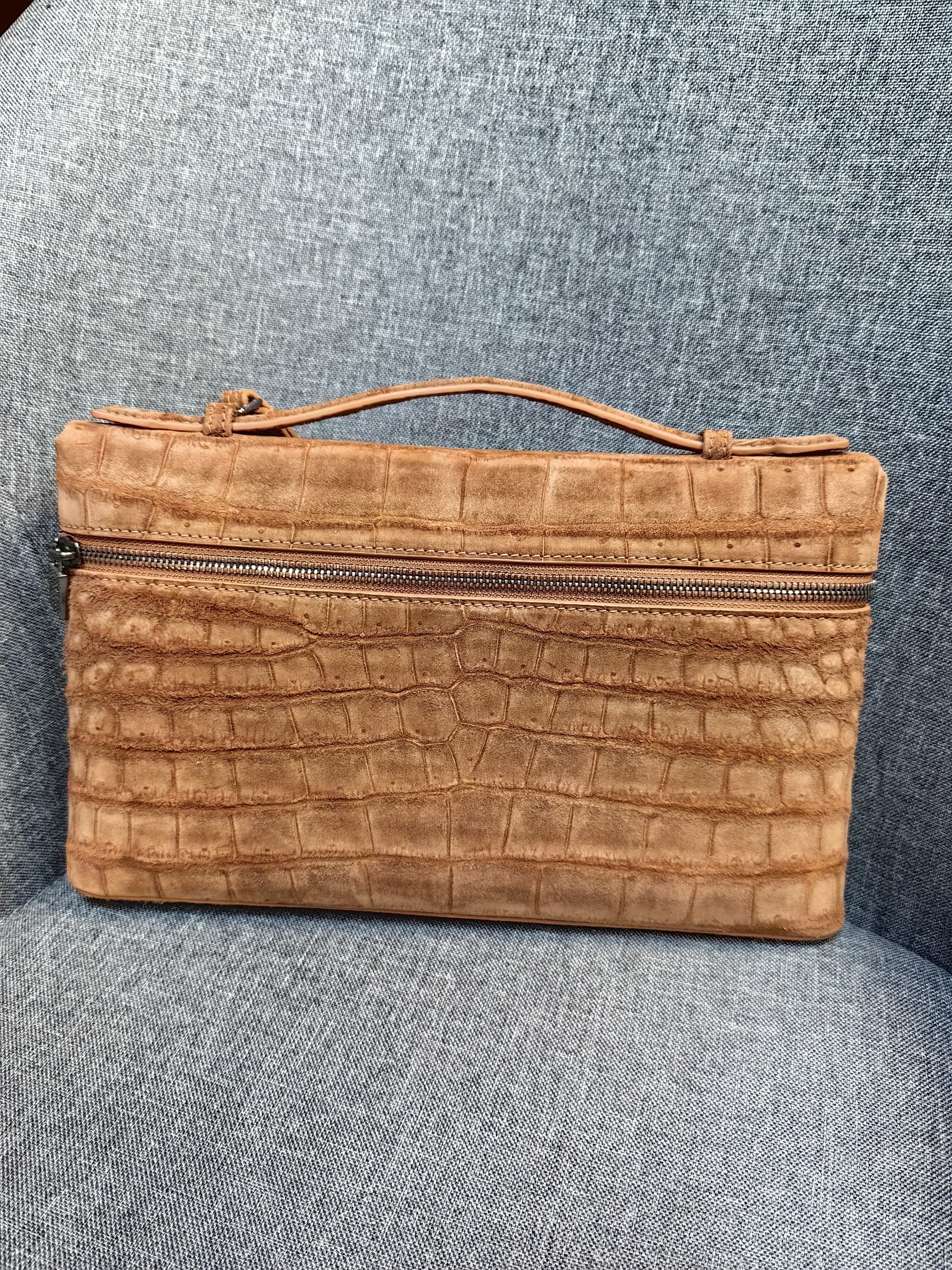 Unisex Rossie Viren crocodile skin leather clutch bag with zipper handle, made from nubuck genuine crocodile leather.