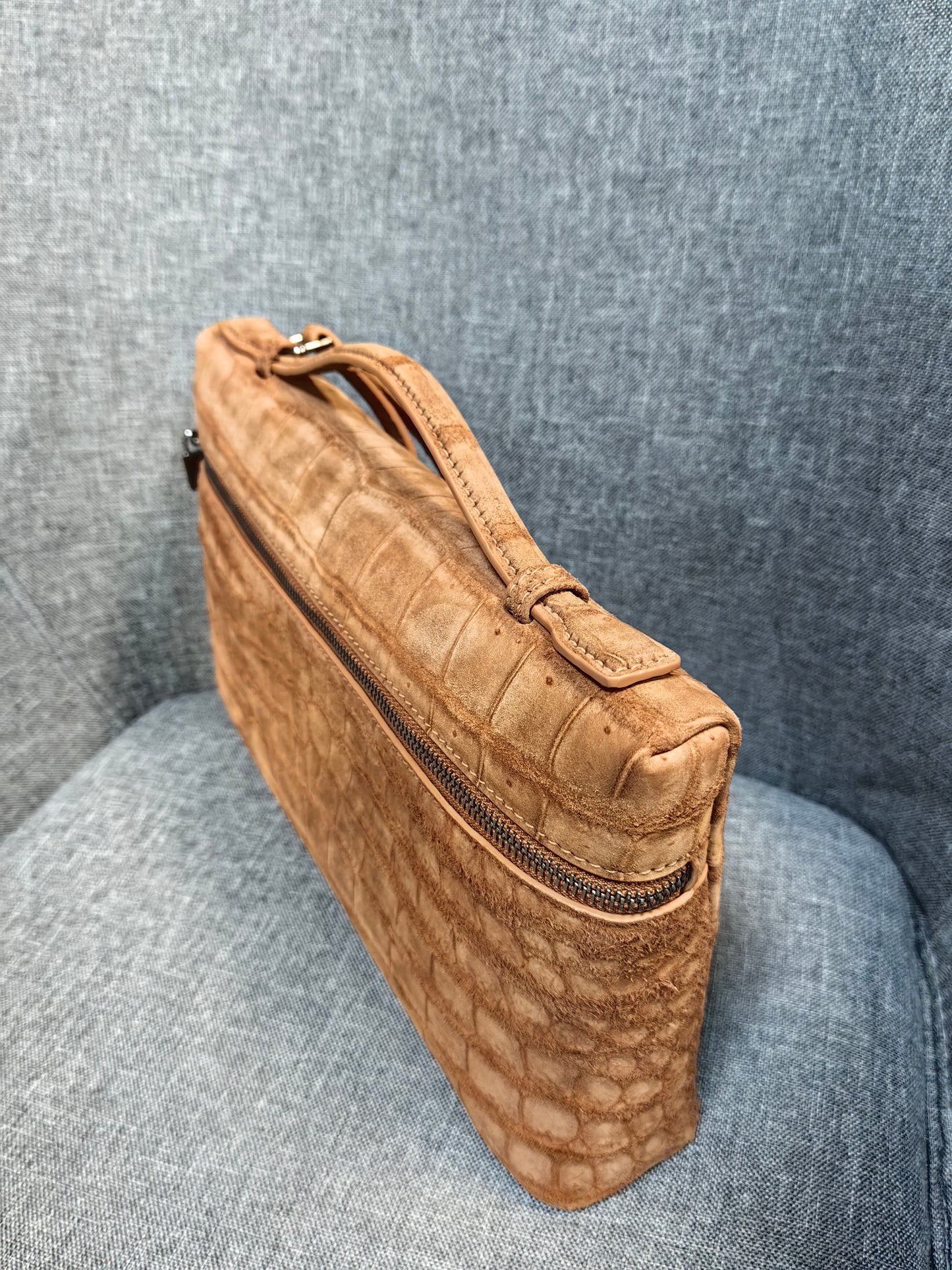 Unisex Rossie Viren clutch handbag with genuine crocodile leather, nubuck finish, zipper handle, stylish and luxurious accessory.