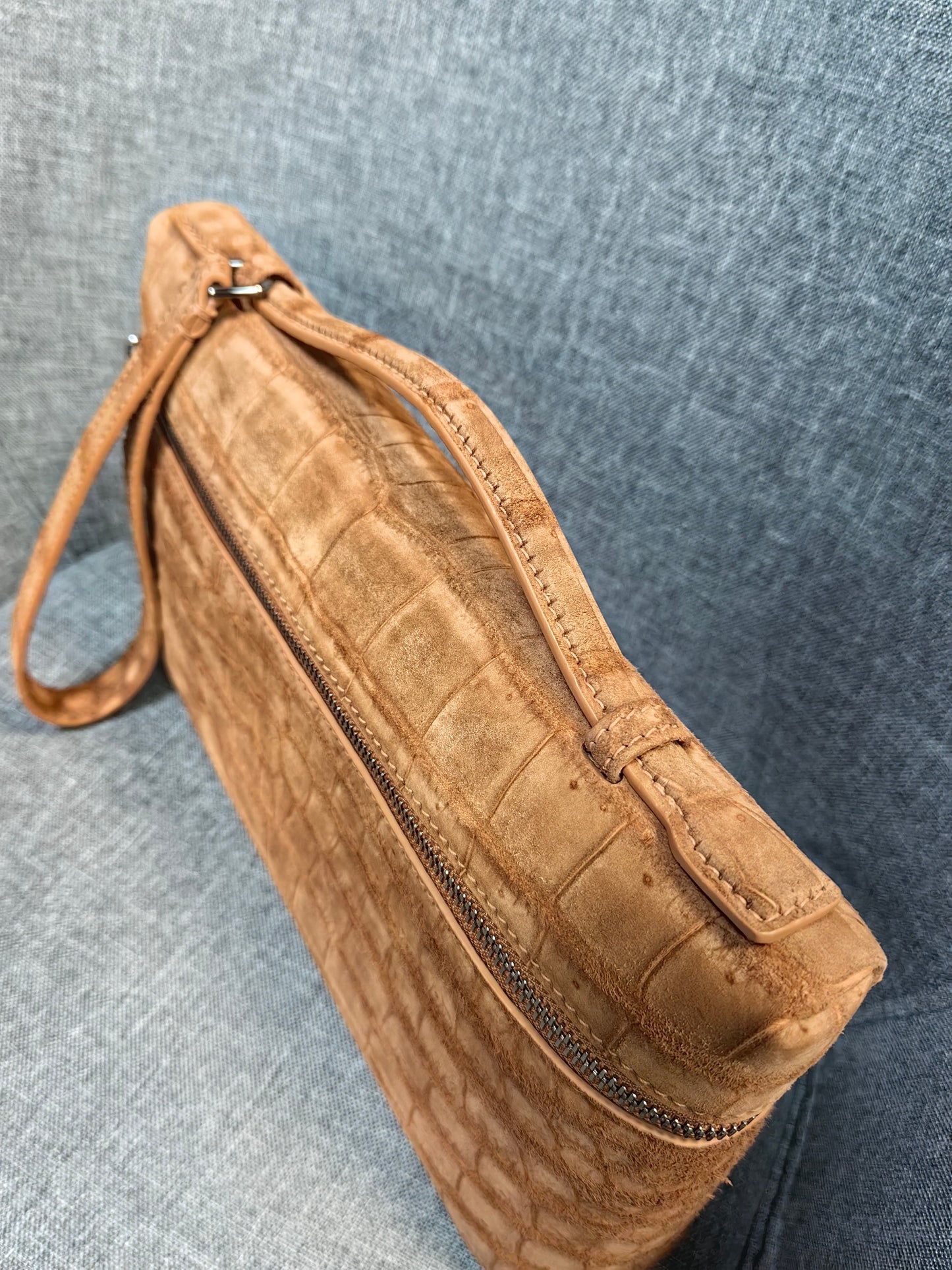Unisex Rossie Viren crocodile leather clutch bag with zipper handle, made from genuine nubuck crocodile skin for a stylish look.