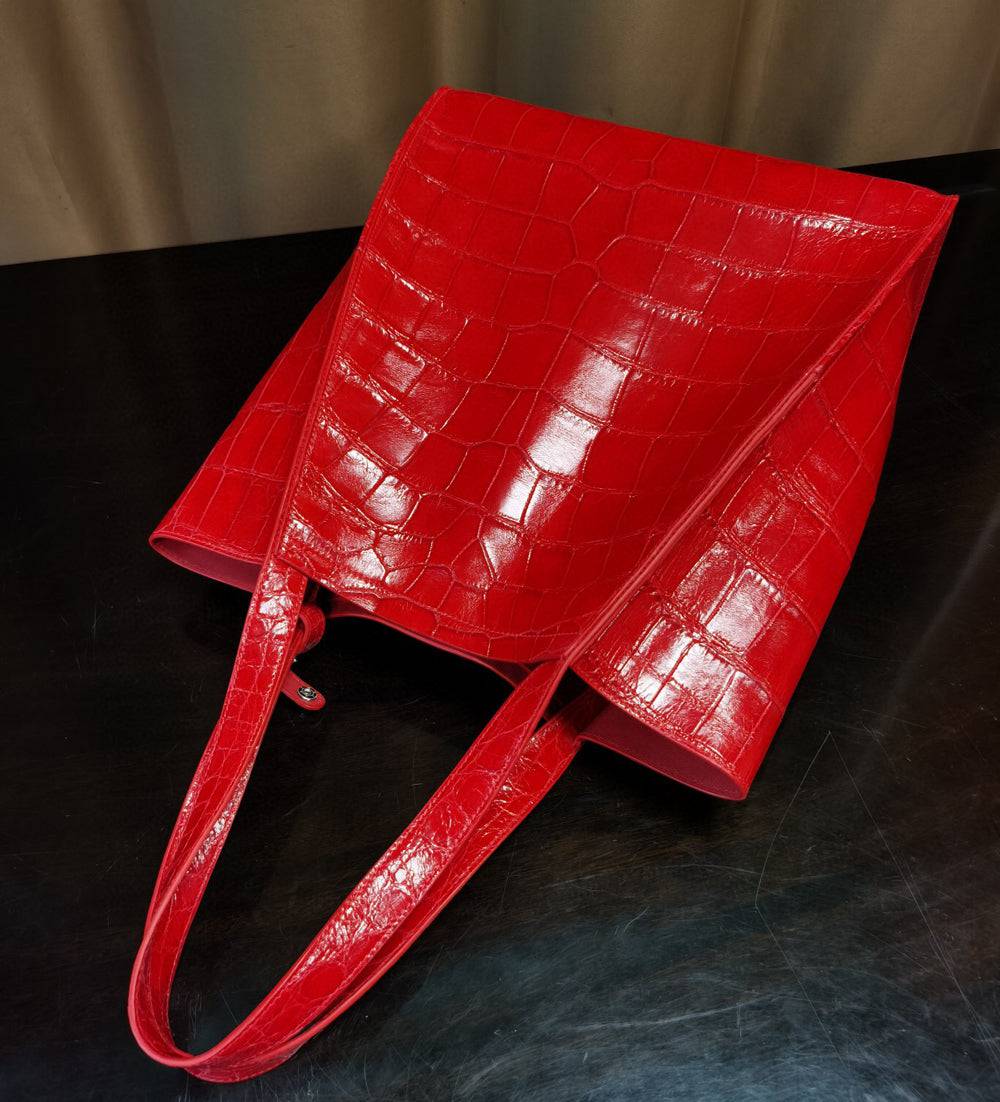 Large crocodile leather shopper tote bag by Rossie Viren, featuring a spacious design and elegant handbag style.