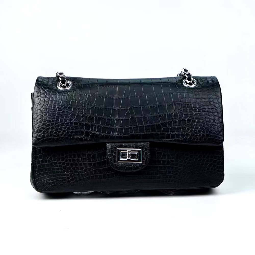 Rossie Viren crocodile leather double flap chain shoulder handbag with gold-tone hardware and sleek design.
