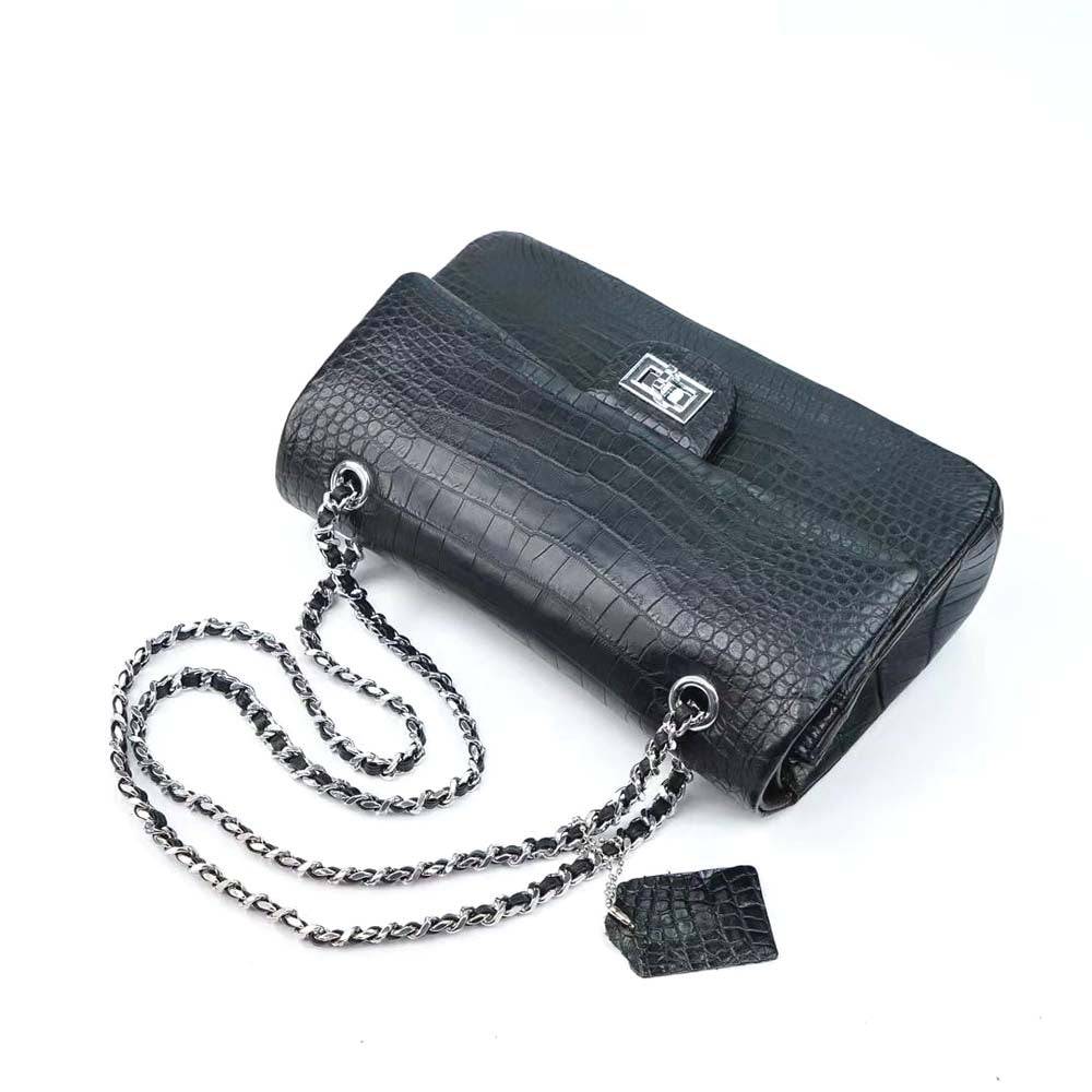 Rossie Viren crocodile leather double flap chain shoulder handbag with sleek design and gold-tone hardware.