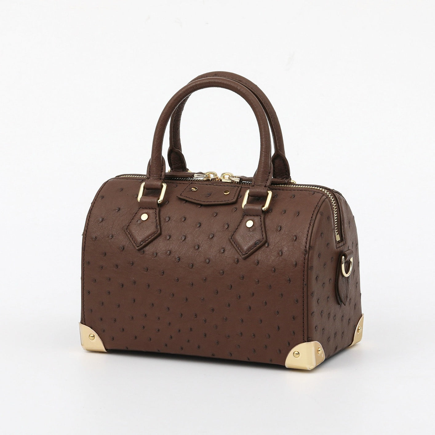 Women's genuine ostrich skin leather top handle pillow bag by Rossie Viren, featuring a sleek design and elegant craftsmanship.