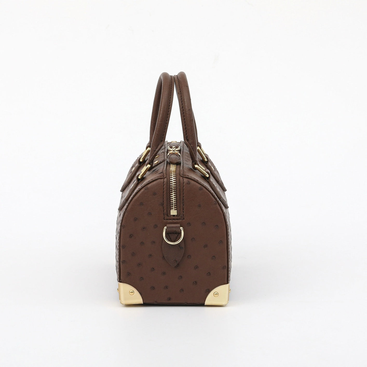 Women's genuine ostrich skin leather handbag with top handle, Rossie Viren pillow bag in black leather.