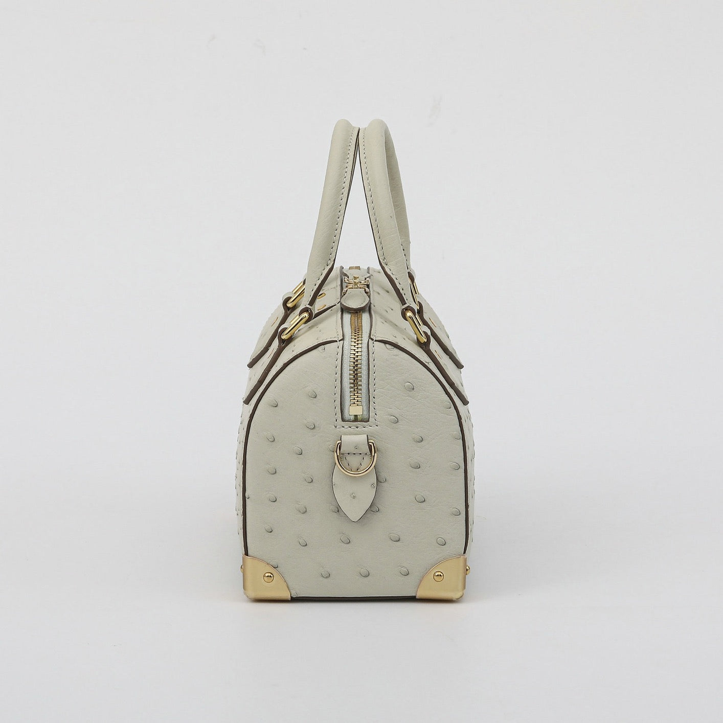 Rossie Viren women's genuine ostrich skin leather top handle pillow handbag with sleek design and textured finish.