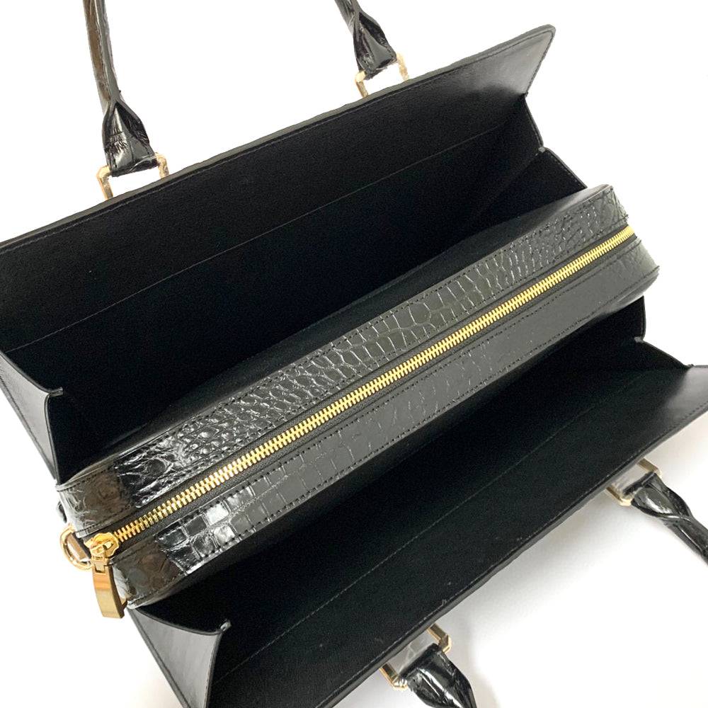 Rossie Viren crocodile skin leather briefcase with bone-colored finish, featuring sturdy handles and a professional business bag design.