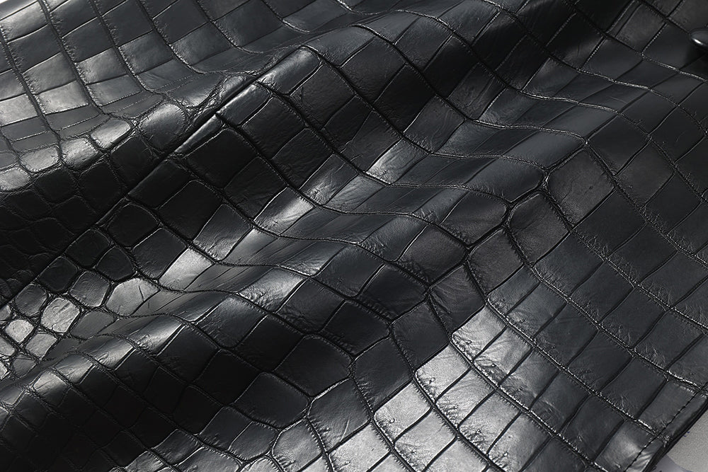 Men's crocodile leather windbreaker jacket by Rossie Viren, shown in black with a sleek, lightweight design.