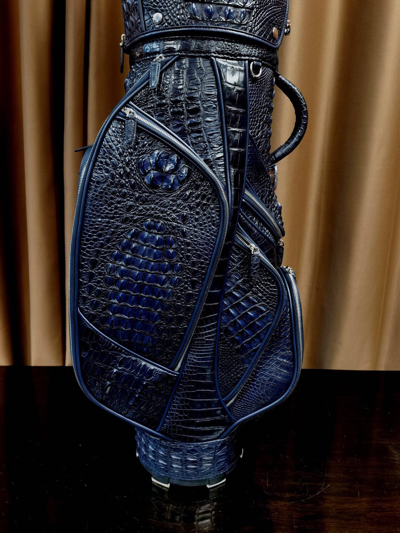 White Crocodile Bone Leather Golf Bag from Rossie Viren featuring a golf set, cart, and stand bag with luxury textured design