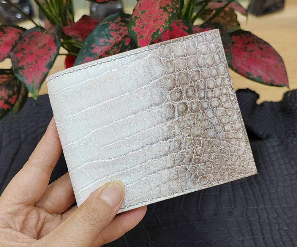 Rossie Viren Himalaya White genuine crocodile leather clutch wallet with sleek design and textured crocodile pattern.