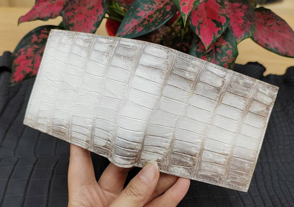 Rossie Viren Himalaya White genuine crocodile leather clutch wallet with sleek design and textured surface.