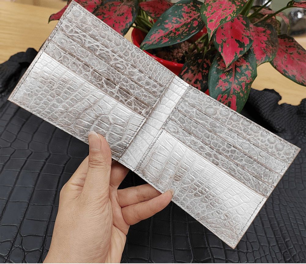 Rossie Viren Himalaya white genuine crocodile leather clutch wallet with sleek design and textured crocodile pattern.