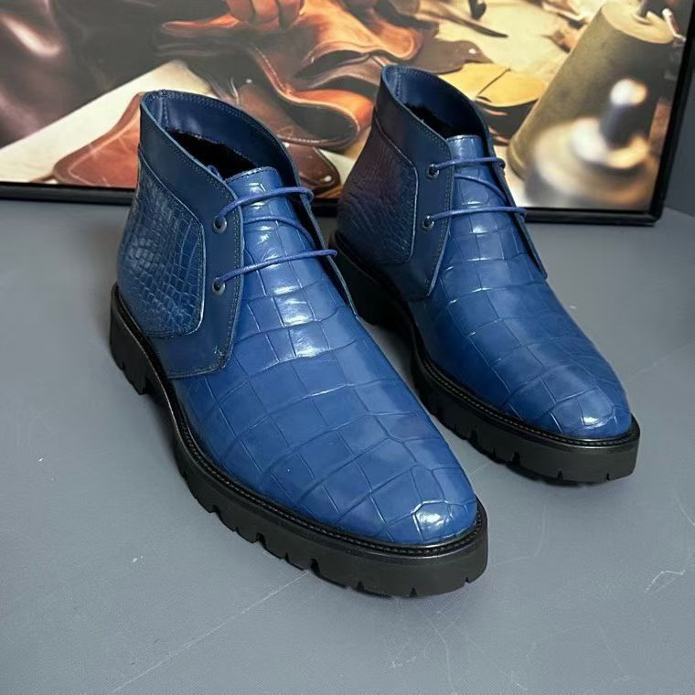 Genuine blue crocodile leather boots from Rossie Viren featuring detailed reptile skin texture and stylish shoe design.