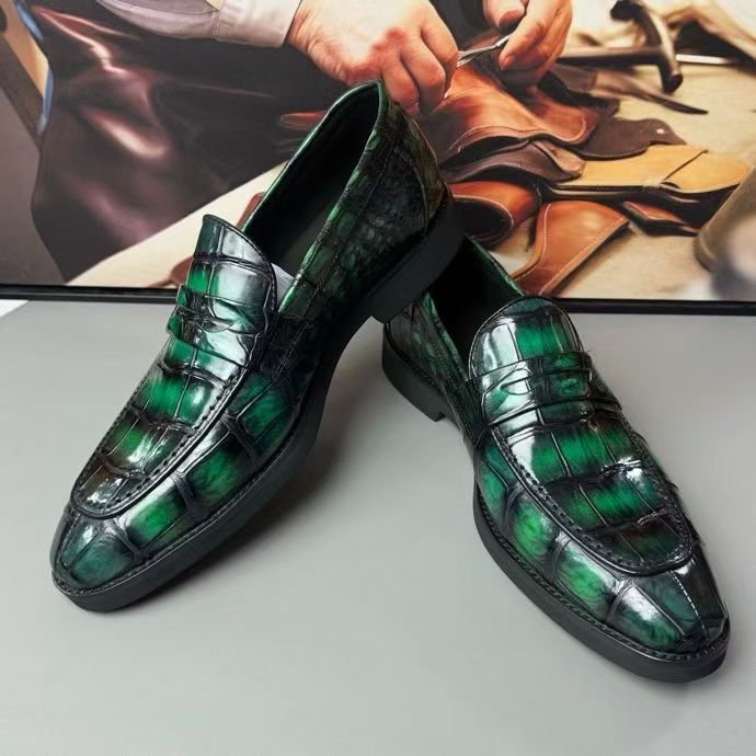 Vintage green crocodile leather loafer shoes by Rossie Viren, featuring detailed crocodile texture and classic slip-on style.
