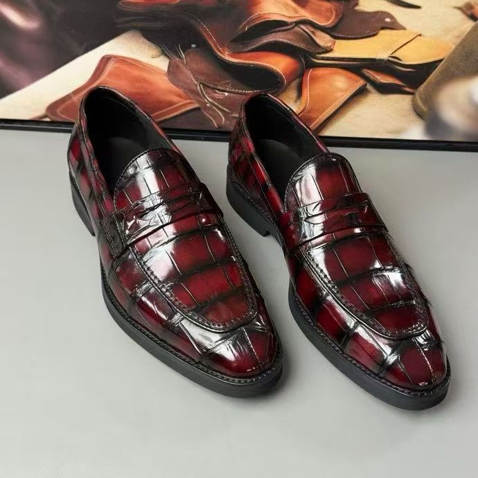 Vintage red crocodile leather loafer shoes by Rossie Viren, showcasing sleek design and premium crocodile texture.