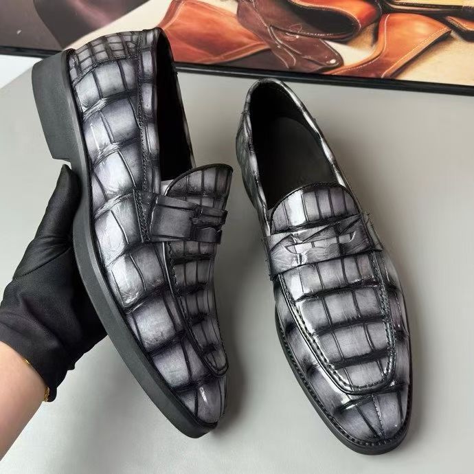 Vintage grey crocodile leather loafer shoes by Rossie Viren, showcasing sleek crocodile texture and classic slip-on style.