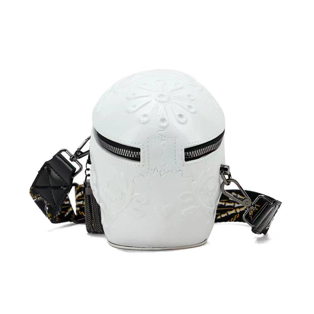 White 3D skull design messenger shoulder handbag by Rossie Viren, compact and stylish for casual or fashion-forward looks.