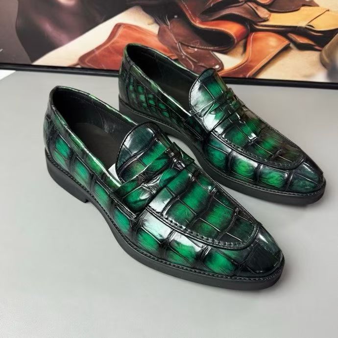 Vintage green crocodile leather loafer shoes by Rossie Viren, showcasing the textured crocodile pattern and classic slip-on design.