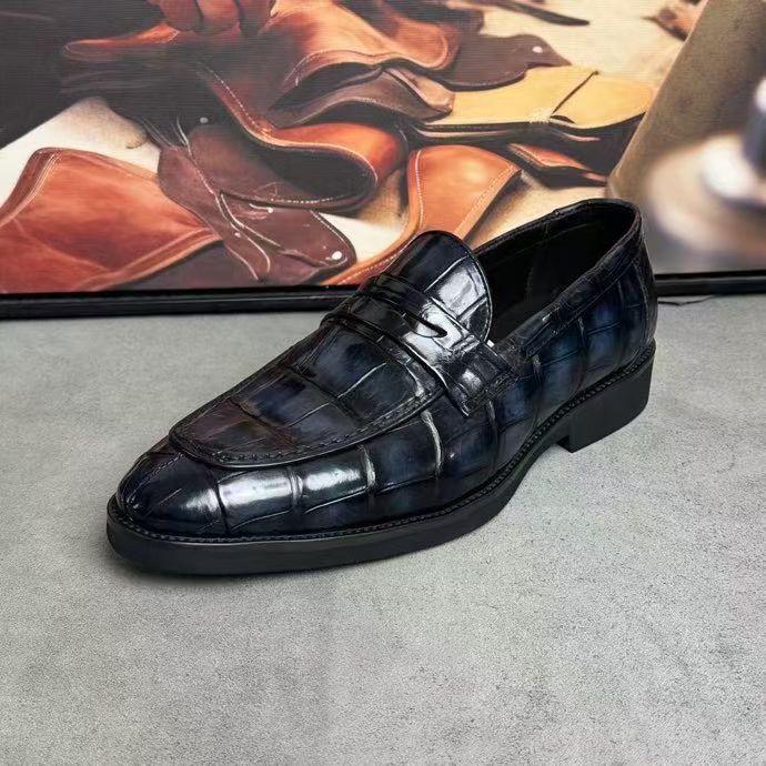 Vintage dark grey crocodile leather loafer shoes by Rossie Viren, showcasing detailed crocodile texture and classic slip-on style.