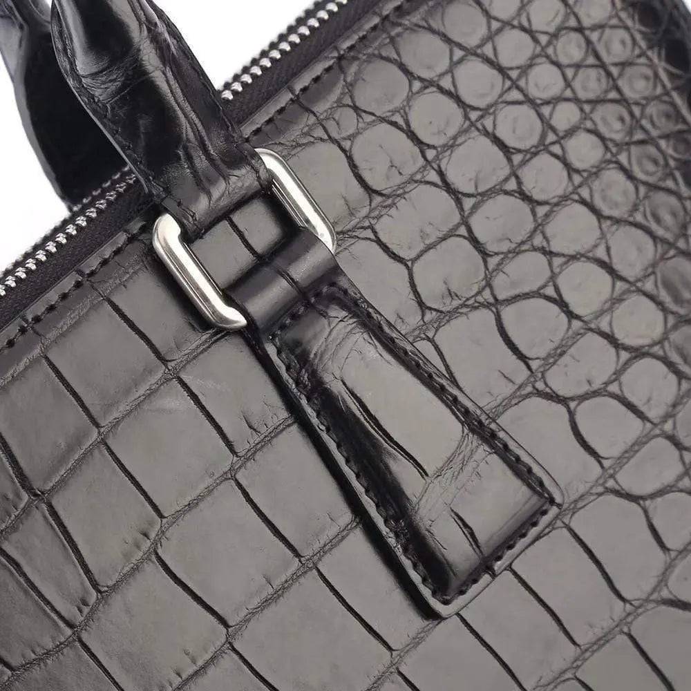 Men's crocodile leather laptop bag briefcase by Rossie Viren, featuring a sleek, structured handbag with top handles and detailed texture.