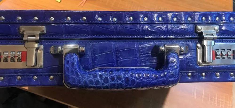 Men's black crocodile bone leather attache case by Rossie Viren, large professional travel handbag with sturdy handle and secure clasp.