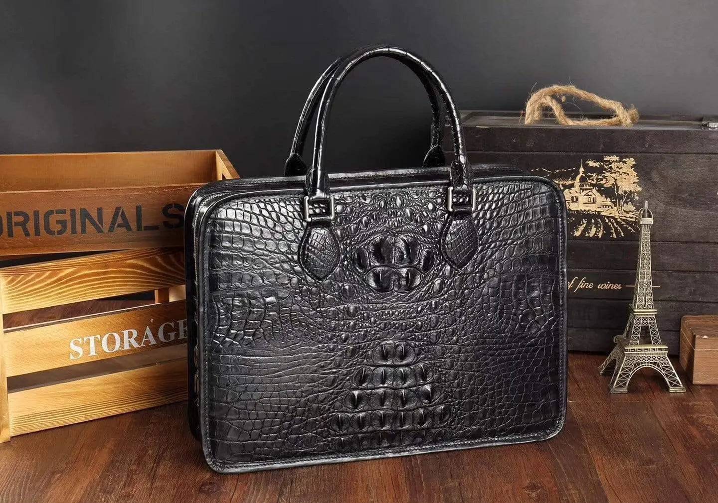Men's crocodile leather briefcase by Rossie Viren with top handle and sleek design, showing textured crocodile pattern and sturdy clasps.
