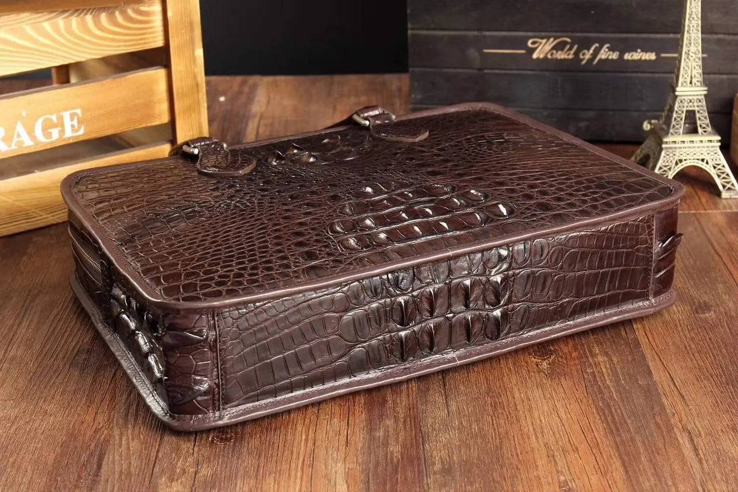 Men's crocodile leather briefcase by Rossie Viren with top handle and structured handbag design, showcasing elegant craftsmanship.
