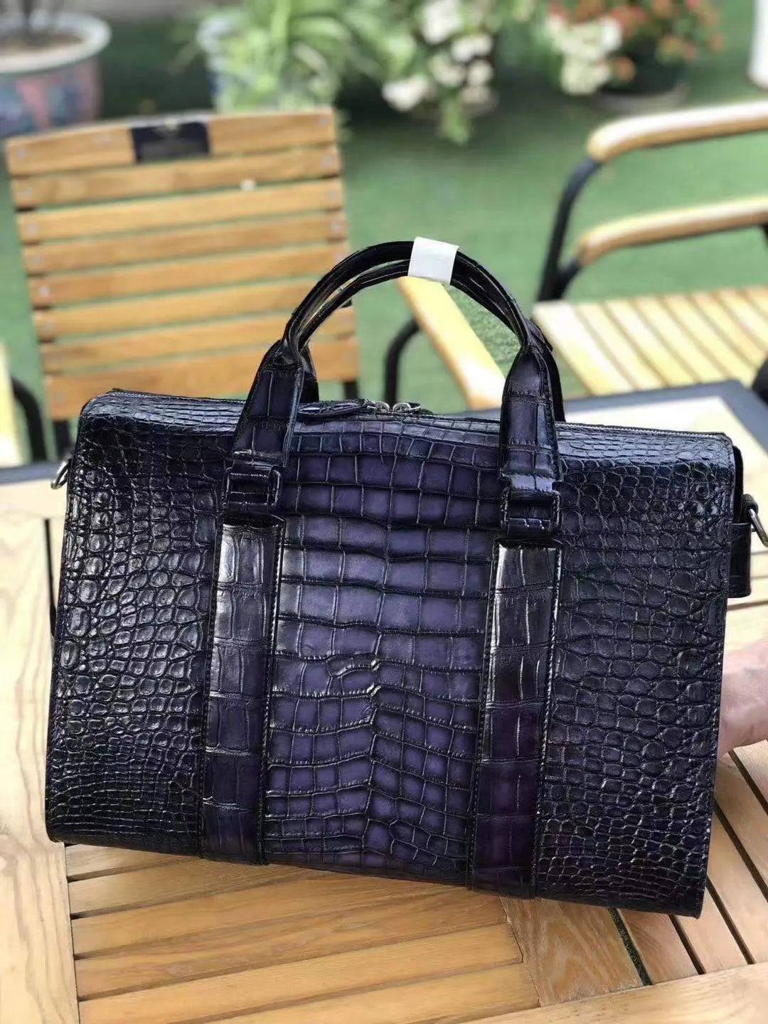 Mens crocodile leather doctor bag with handles and a laptop compartment, crafted by Rossie Viren for organized, stylish carrying.