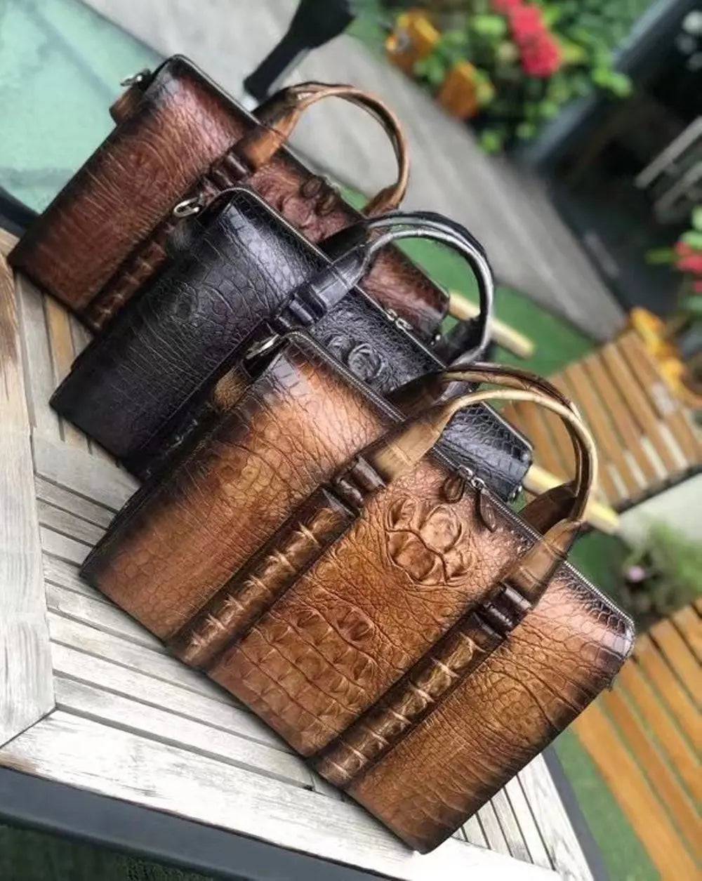 Rossie Viren men's crocodile leather doctor bag with handle, designed for laptops and professional use, featuring a classic, structured style.