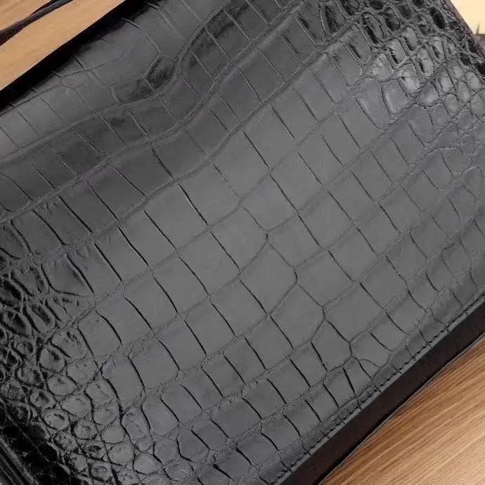 Men's crocodile leather messenger bag with adjustable crossbody strap, designed for laptops, by Crocodile Leather Bags And Shoes.
