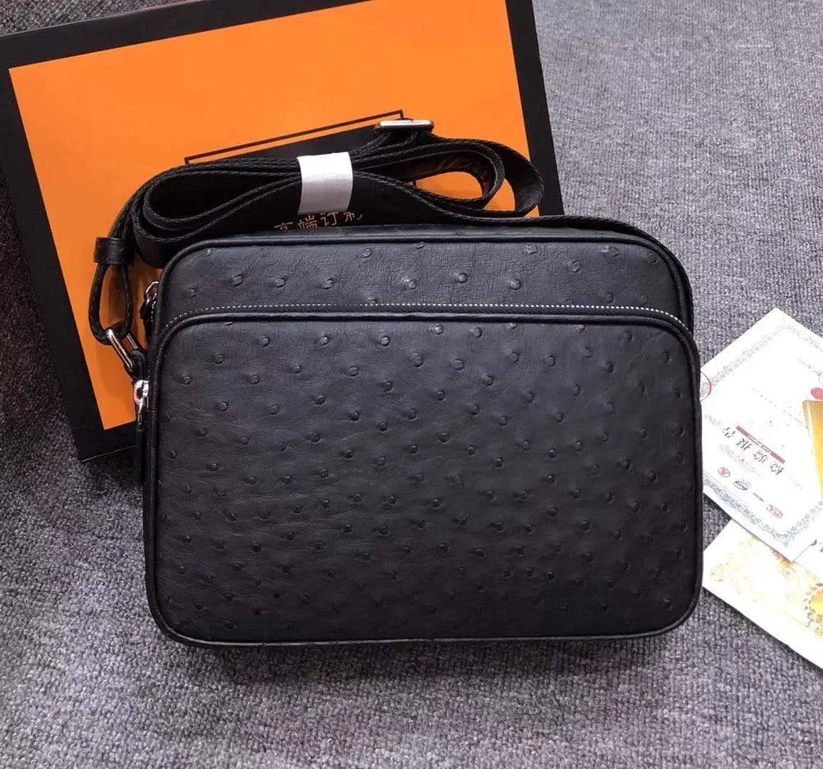 Mens messenger bag made of ostrich leather by Rossie Viren, featuring a cross-body shoulder design and stylish handbag style.