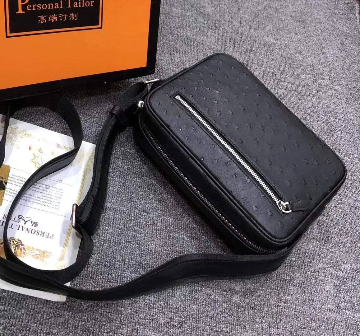 Mens messenger bag made of ostrich leather, Rossie Viren cross body shoulder bag with a sleek, structured handbag design.