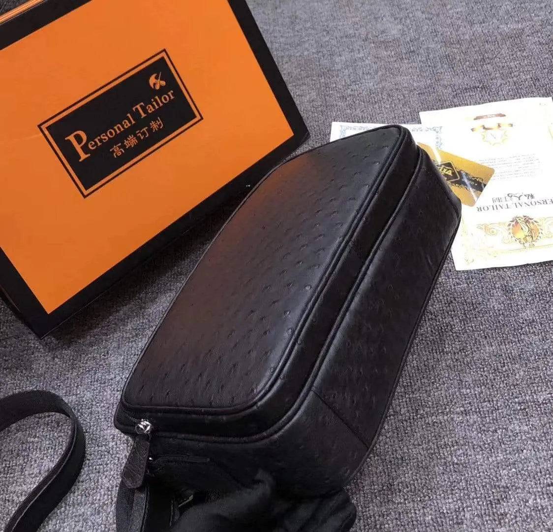 Mens messenger bag made of ostrich leather, Rossie Viren cross-body shoulder bag with adjustable strap and multiple compartments.