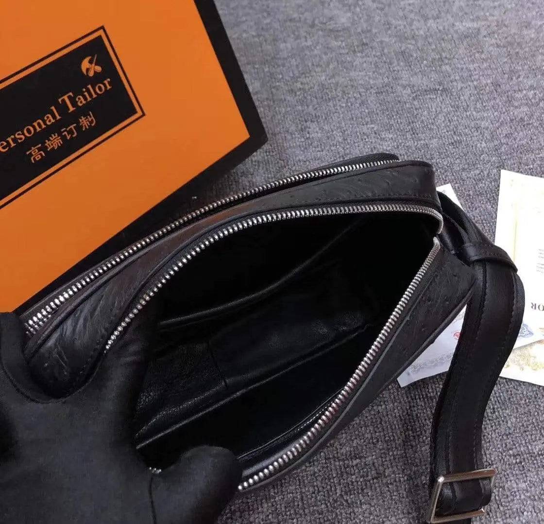 Mens messenger bag made of ostrich leather by Rossie Viren, featuring a cross-body shoulder design with multiple compartments.
