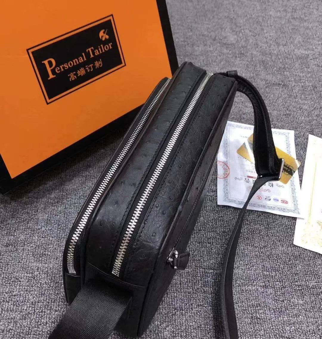 Men's messenger bag made of ostrich leather by Rossie Viren, featuring a cross-body shoulder design and spacious handbag style.