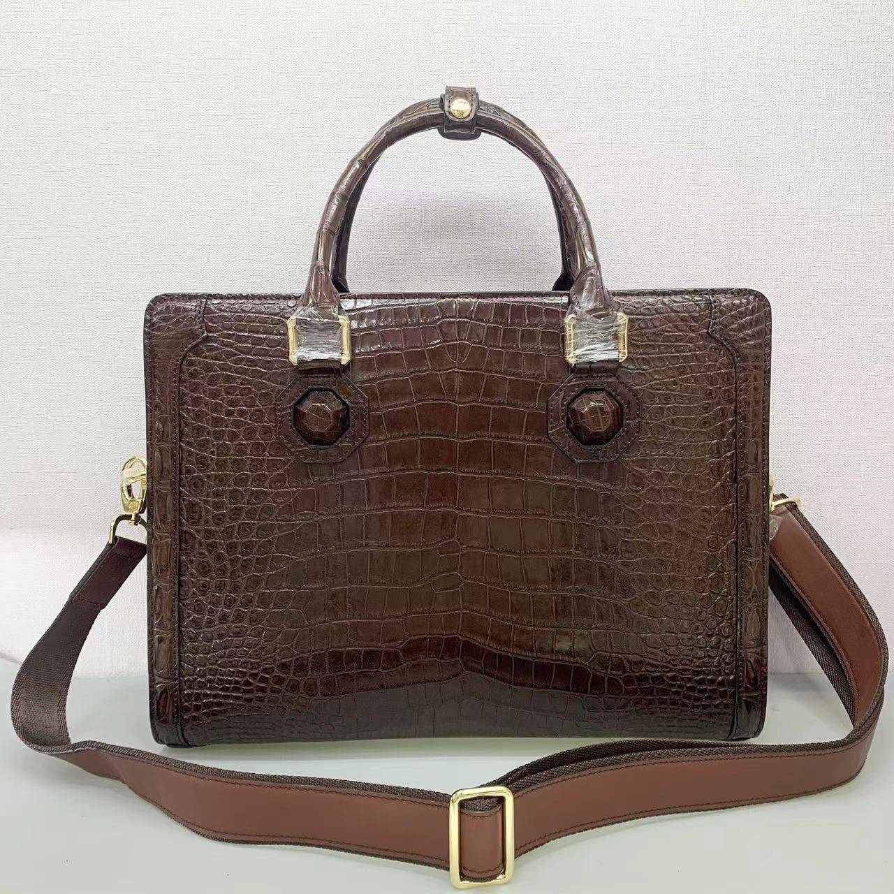 Rossie Viren crocodile skin briefcase with belly leather, business bag featuring a sleek, professional design and textured crocodile pattern.