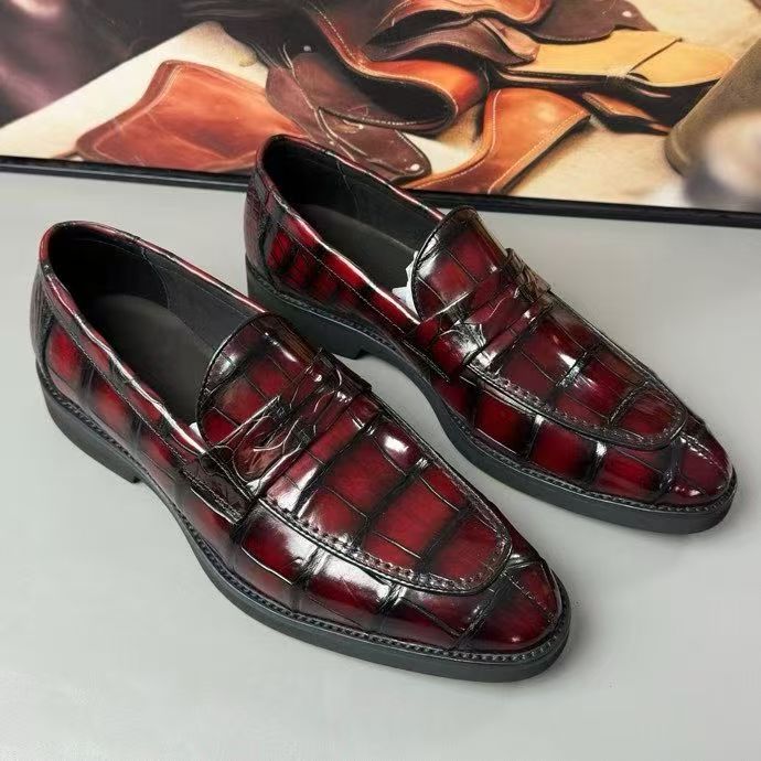 Vintage red Rossie Viren crocodile leather loafer shoes with detailed crocodile pattern and classic slip-on design.