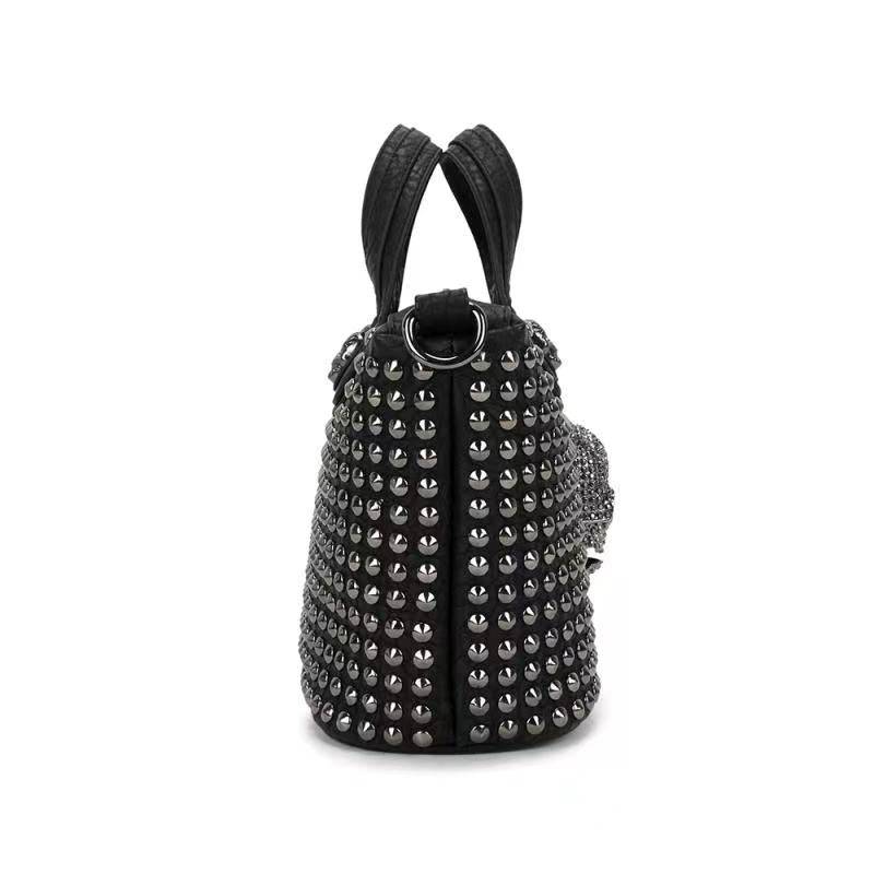 Rossie Viren 3D crystal skull shoulder bag with studded tote design, featuring a detailed crystal skull and studded accents.