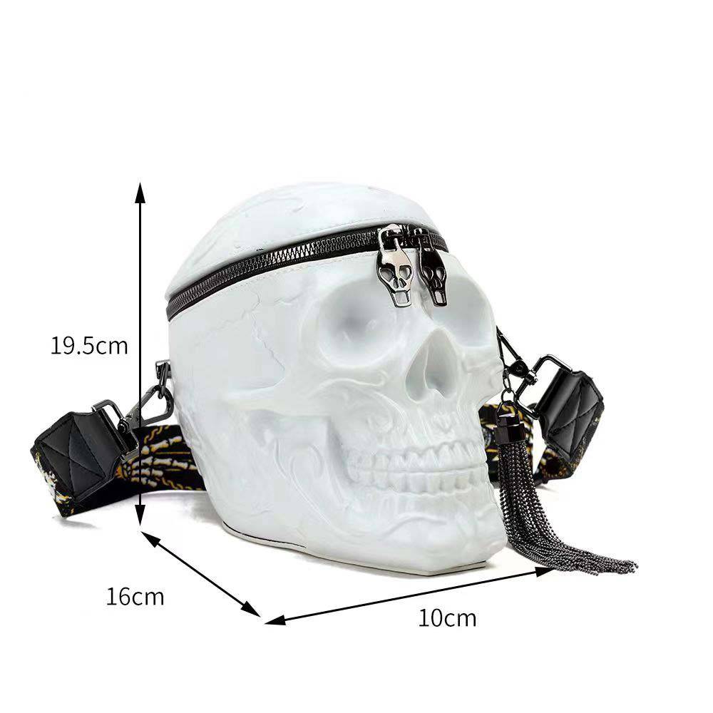 White 3D skull messenger handbag by Rossie Viren, compact shoulder bag featuring detailed skull design and adjustable strap.