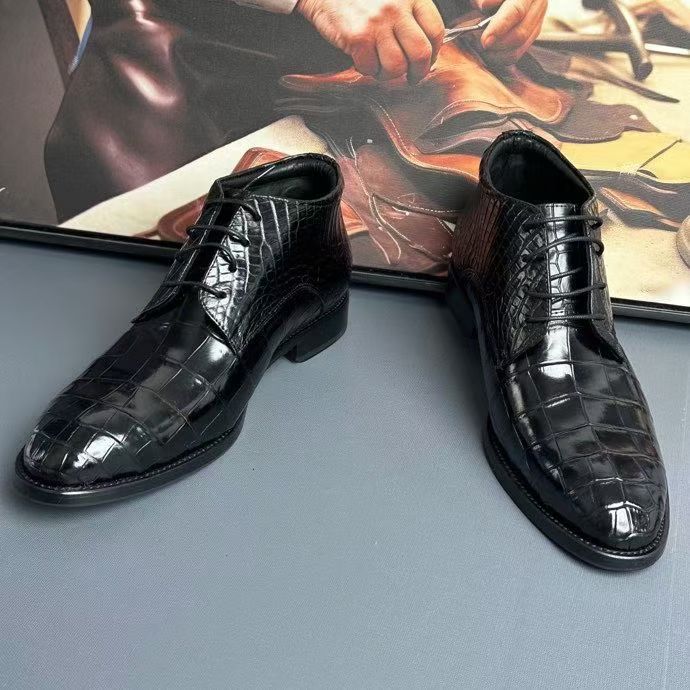 Black genuine crocodile leather boots by Rossie Viren, stylish crocodile skin shoes with detailed texture and sleek design.