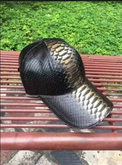 Rossie Viren Python baseball cap with embroidered snake design, adjustable strap, and classic curved brim.