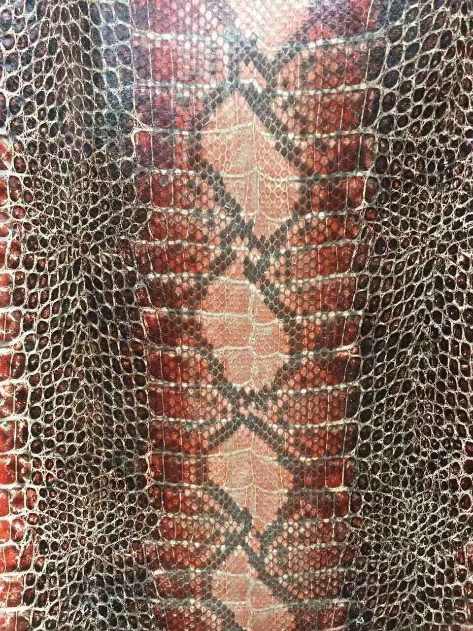 Python skin leather accessory in vibrant colorway, showcasing textured crocodile pattern from Rossieviren Exotic Skin Leather Bags.