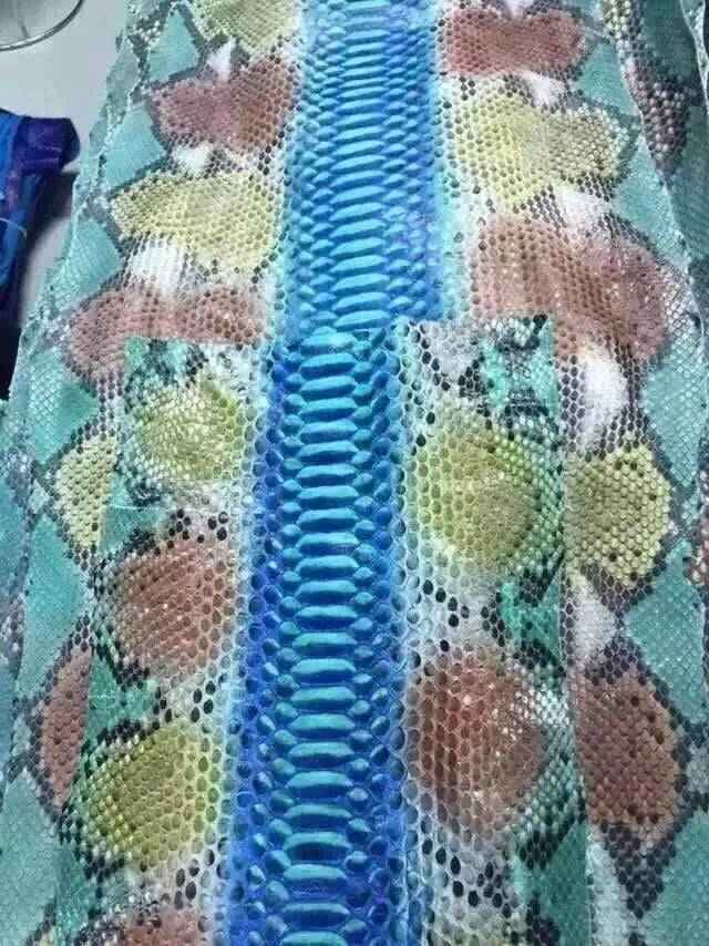 Python skin leather in vibrant colorway, showcasing textured crocodile pattern on an Exotic Skin Leather Bag or accessory.